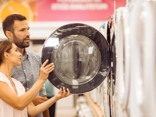 couple buying washing machines
